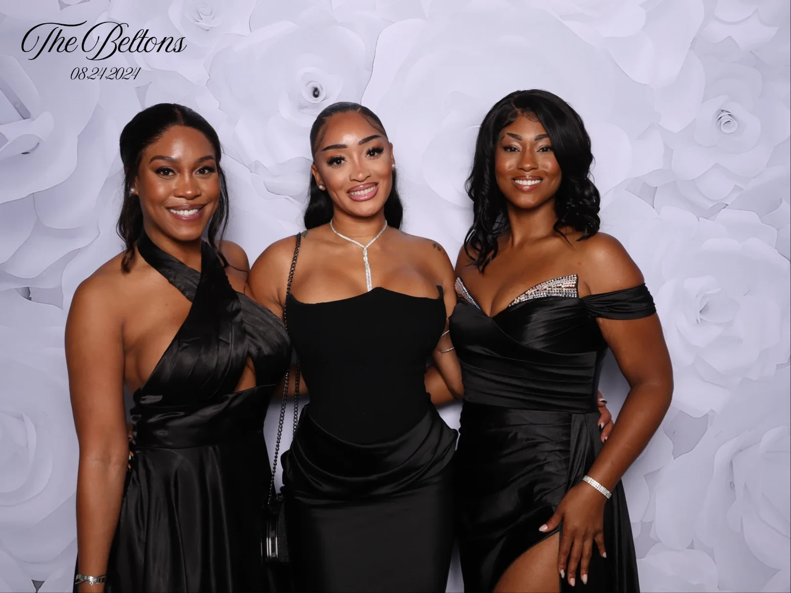 Christopher and Teona wedding photo booth Virginia Beach 2024 — elegant black gowns