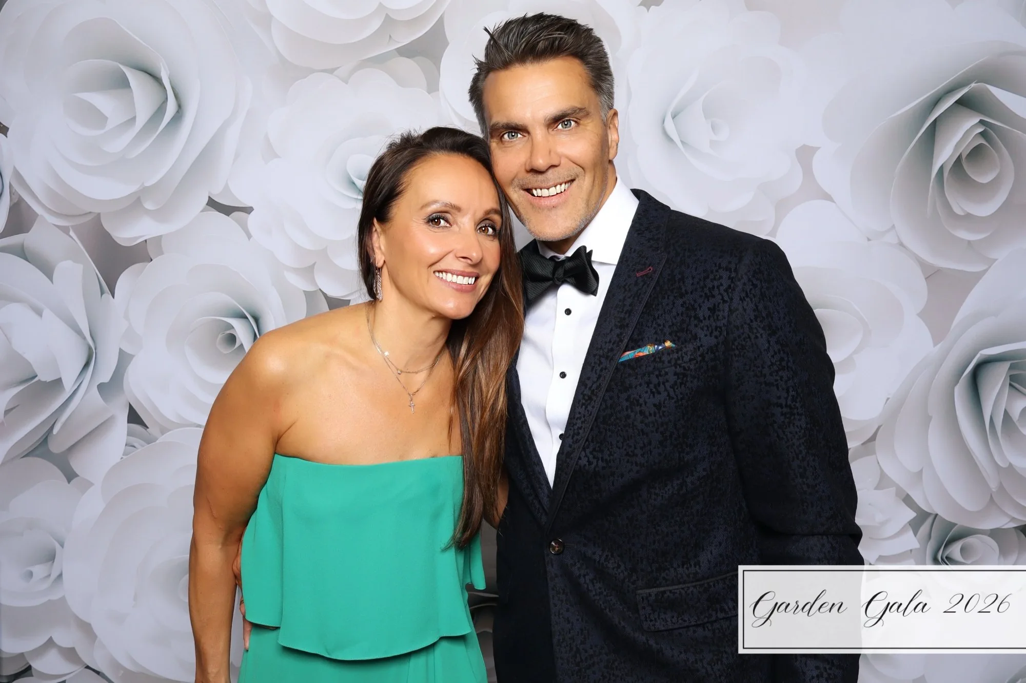 Garden Gala 2026 elegant couple photo booth Hampton Roads Virginia — formal gala white flower backdrop