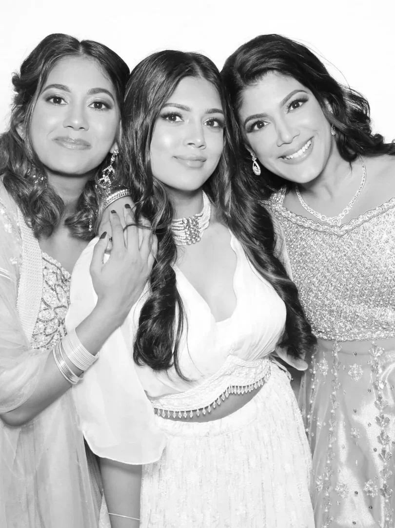 Black and white glam photo booth — three elegantly dressed women, Virginia Beach