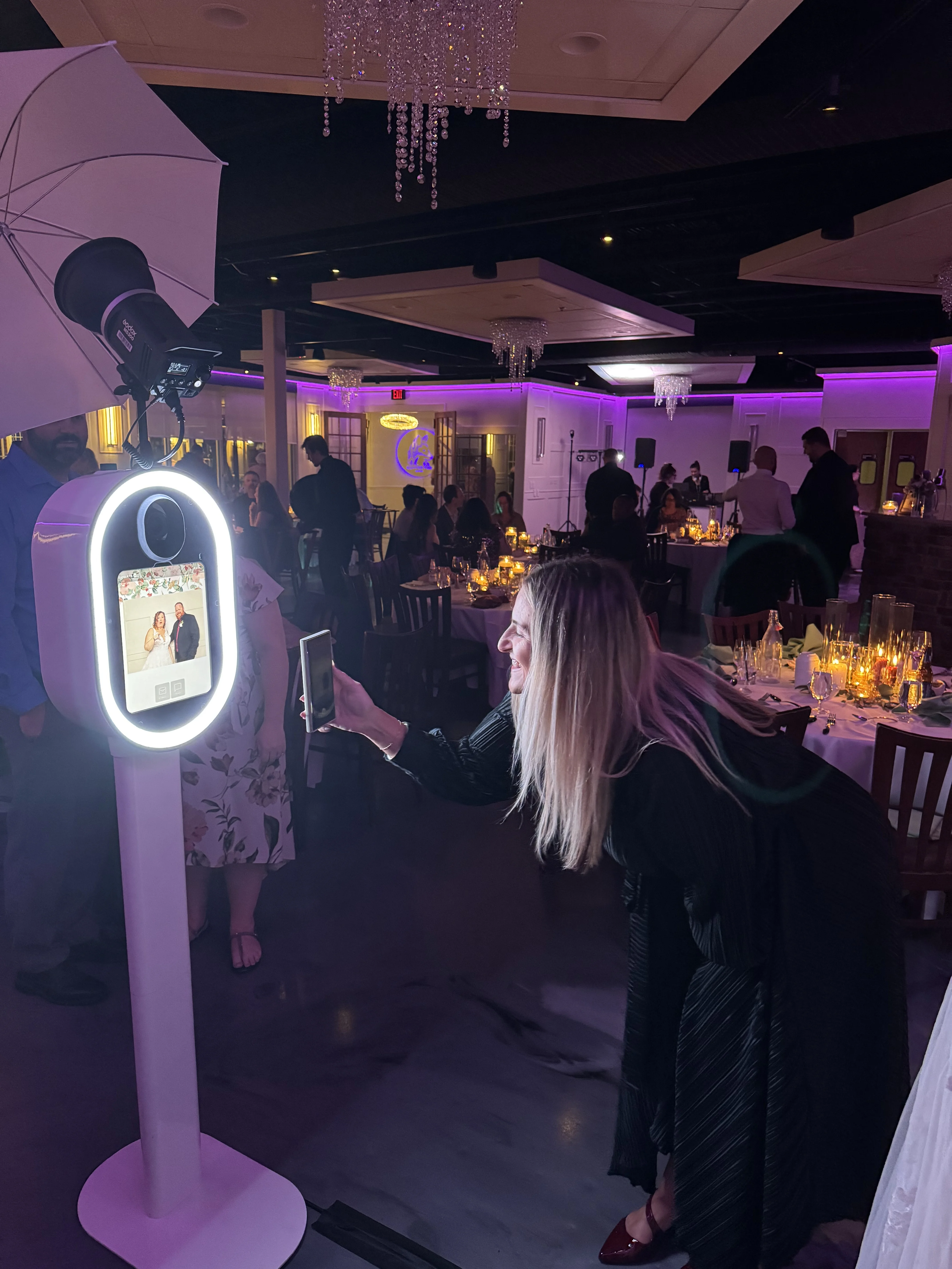 Glam photo booth luxury event purple lighting Hampton Roads Virginia — VIP open air booth with dramatic ambient glow