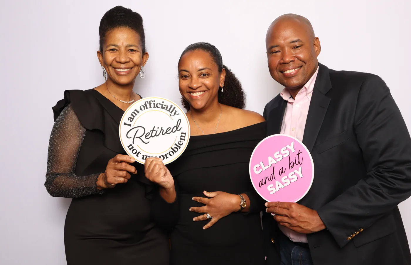 Retirement party photo booth fun — 'I am officially retired' sign, Virginia Beach