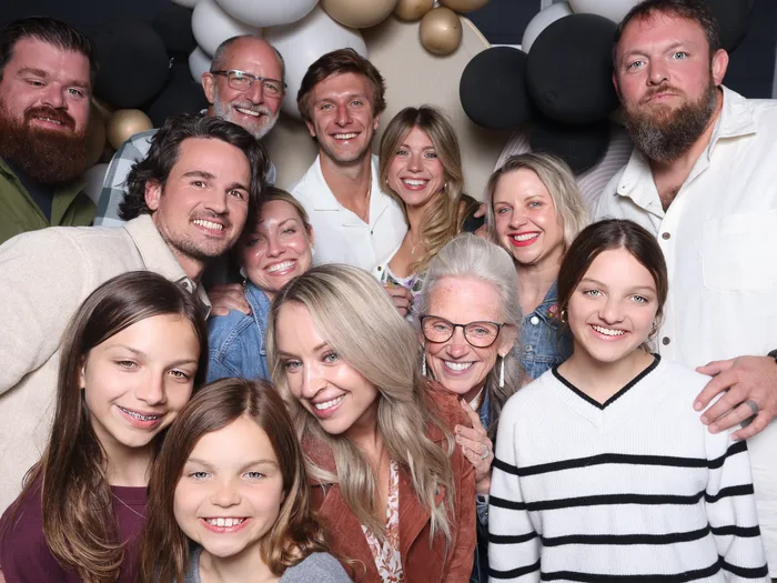 Family celebrating together at 40th birthday party photo booth Hampton Roads