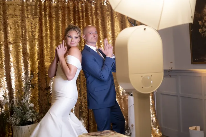 Wedding guests at photo booth rental Virginia Beach reception
