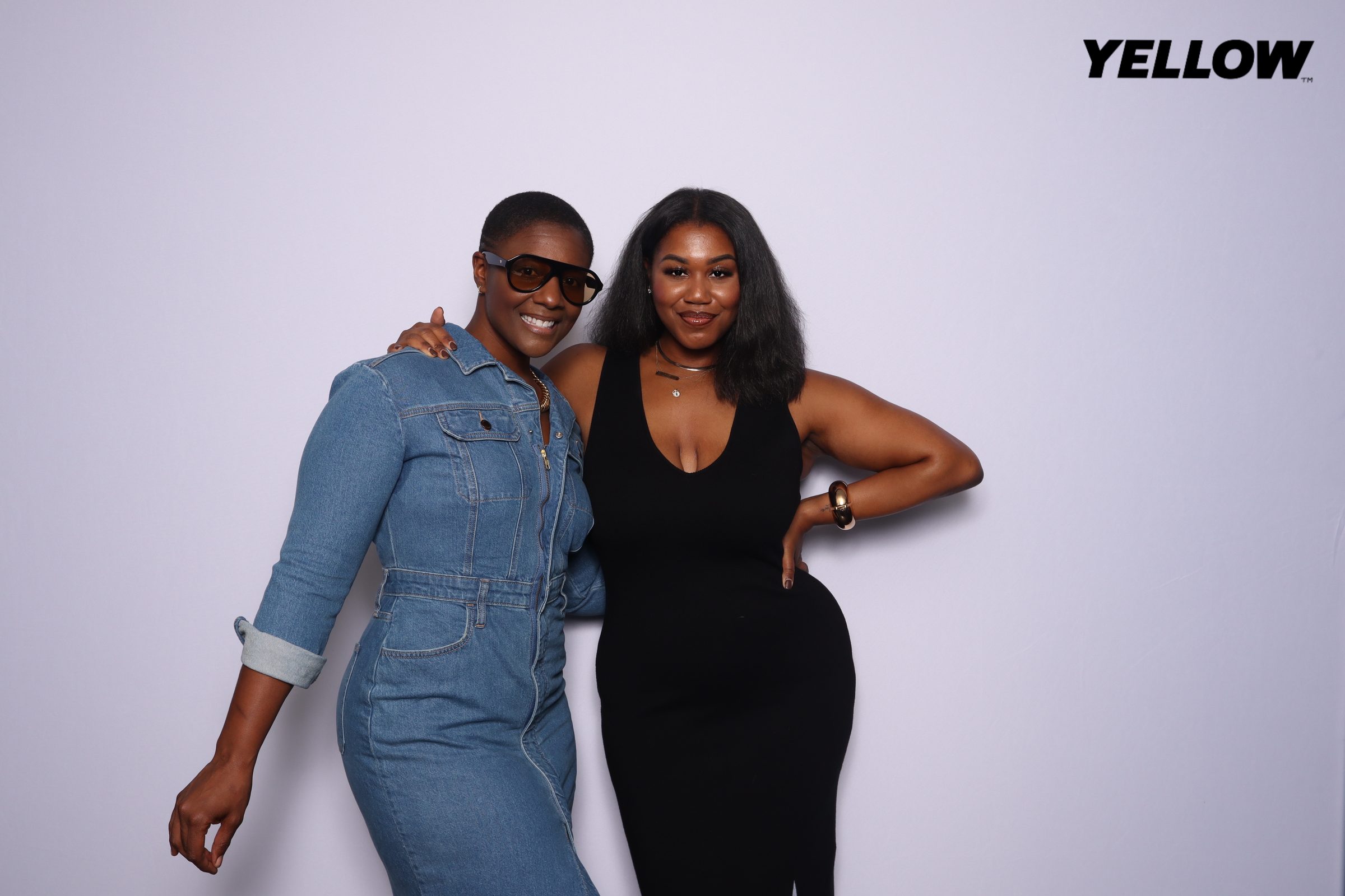 Yellow Social event photo booth Virginia Beach 2024 — two guests posing at branded activation